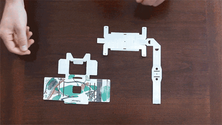 Pilot Program-era design of the Foldscope being assembled.